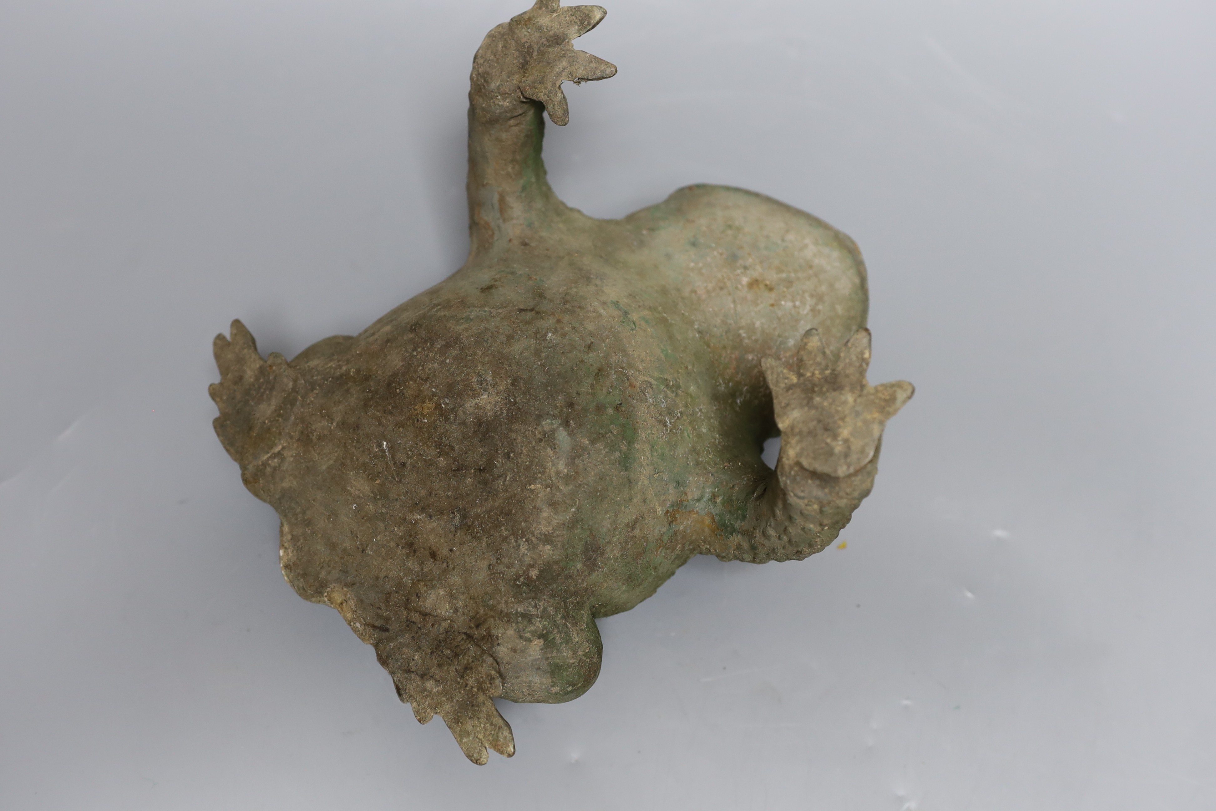 A Japanese bronze model of a toad, 25cms long